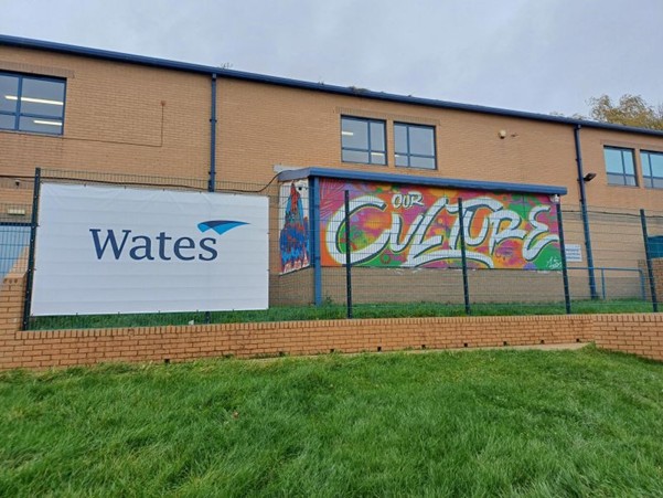 Deighton Community Comes Together to Transform Construction Site with Vibrant New Mural