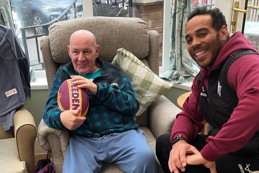 Giants Deliver ‘Really Special’ Day for Former Coach with Surprise Care Home Visit